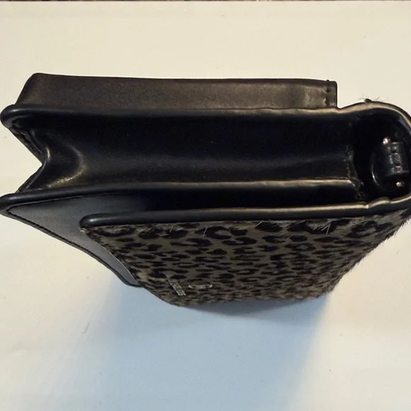 Michael Kors Animal Print and Black Clutch - Picture 15 of 16